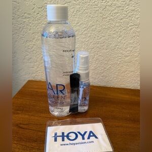 Hoya Lens Cleaning Kit: Cleanser in Spray Bottle, Large Refill Bottle & 2 Cloths
